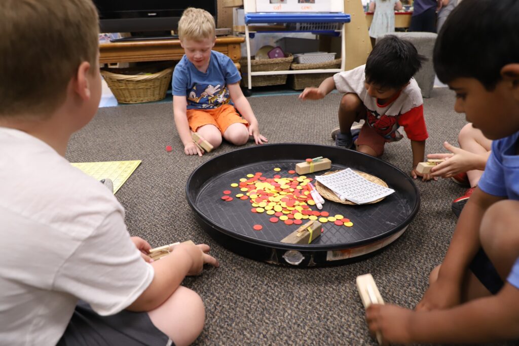 Gallery of images showing young children playing at a variety of spaces, painting, playing with blocks, and math, and crafts